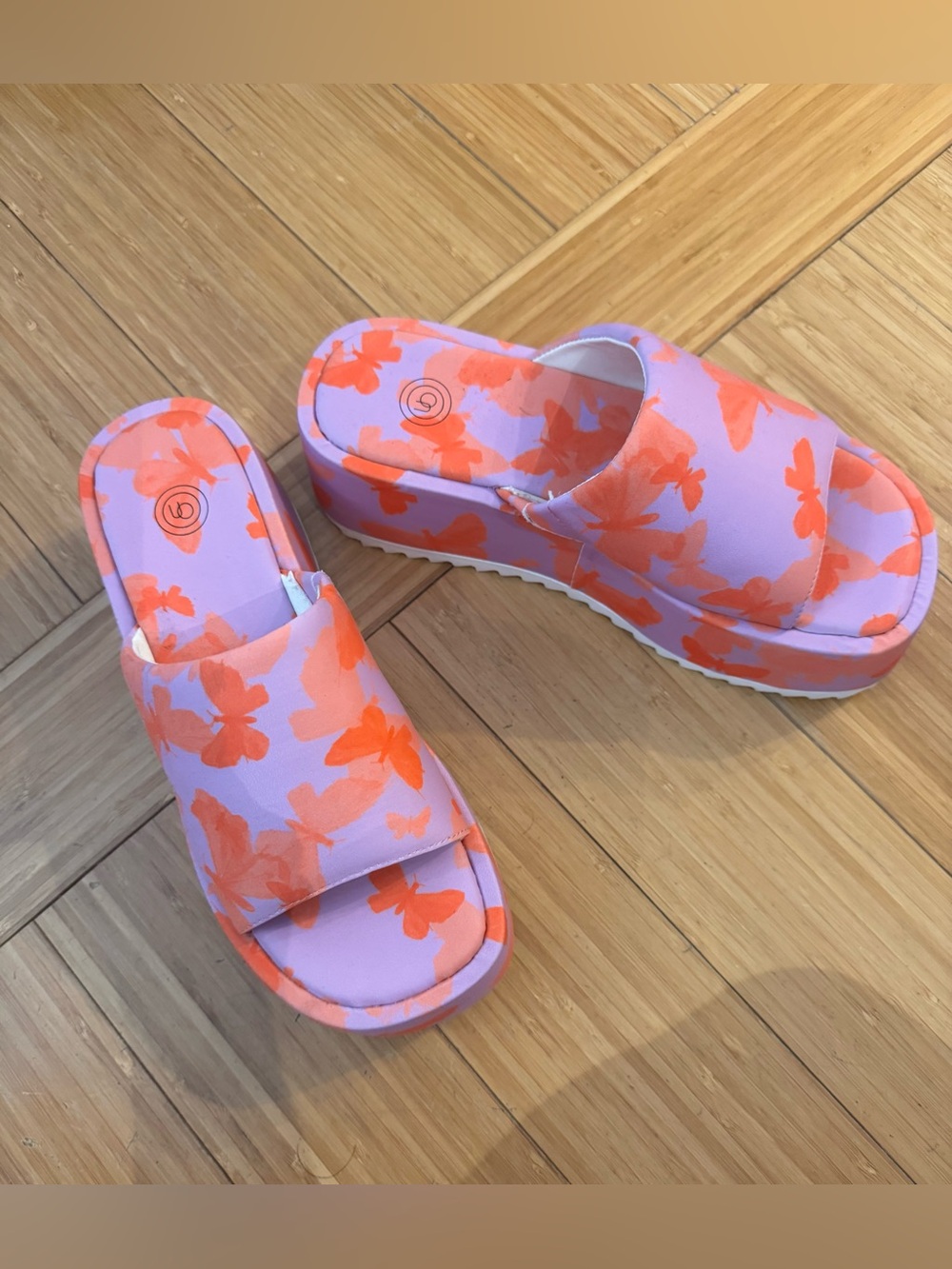 Butterfly wedge sandals